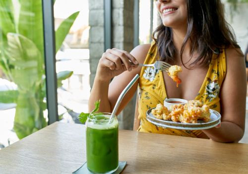 healthy balanced meal and green smoothie for mindful eating during menopause