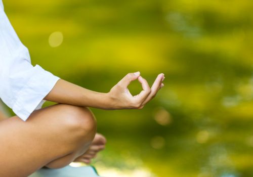 woman practicing meditation and vagus nerve breathing for stress reduction
