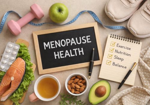 Flat lay of healthy lifestyle items including salmon, avocado, nuts, tea, dumbbell, walking shoes and a checklist representing nutrition, exercise and balanced habits during menopause