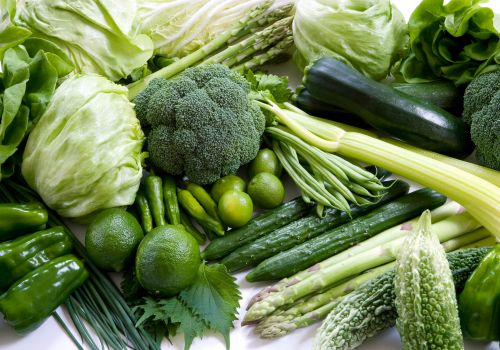 Fresh cruciferous and green vegetables like broccoli, cabbage, asparagus and leafy greens for natural menopause hormone and liver support