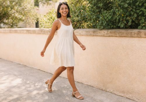 woman walking confidently in sandals summer foot comfort after 40